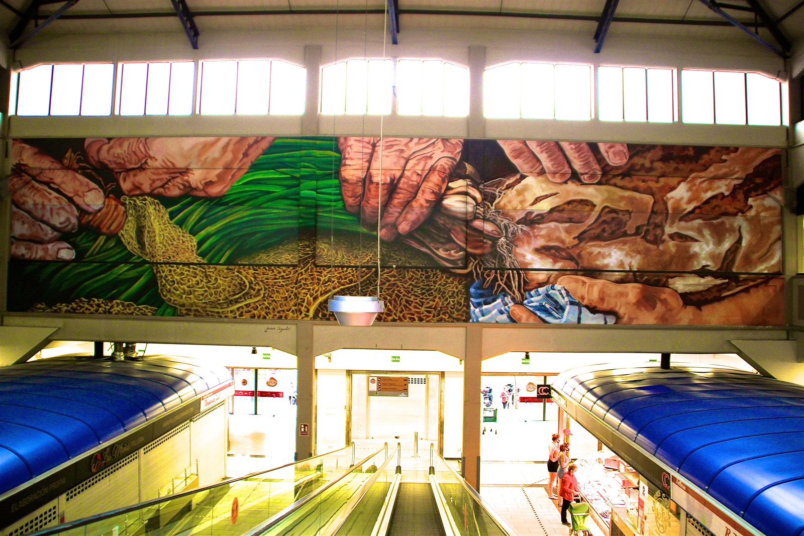 The mural above the escalators inside Mercat de l'Olivar in Palma de Mallorca