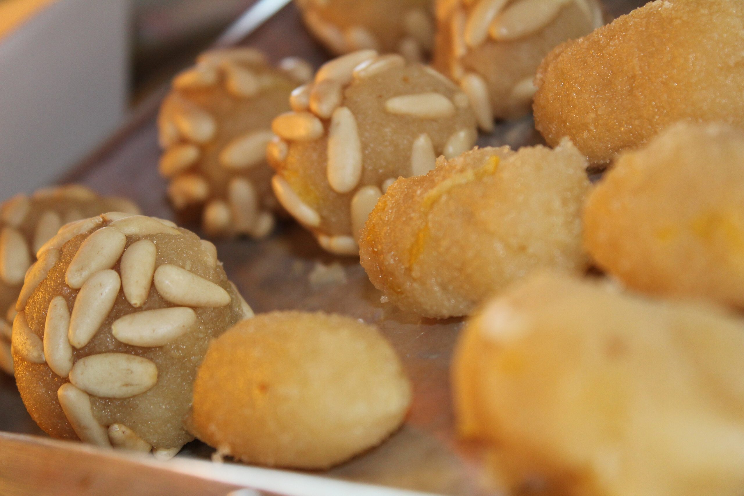 Close-up of pine nut panellets made from almond marzipan for Tots Sants